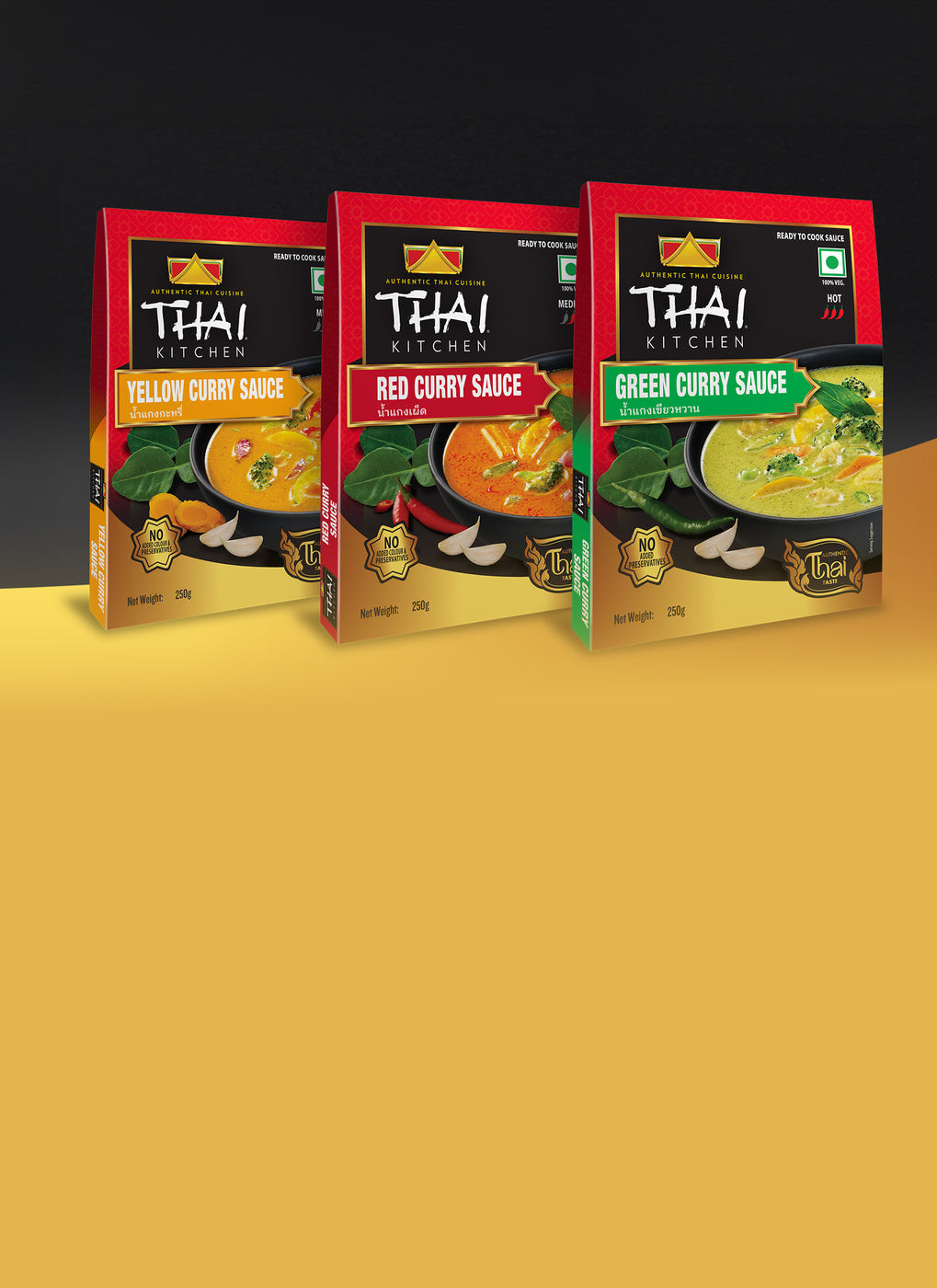Three Thai Kitchen curry sauce packages: Yellow Curry, Red Curry, and Green Curry.